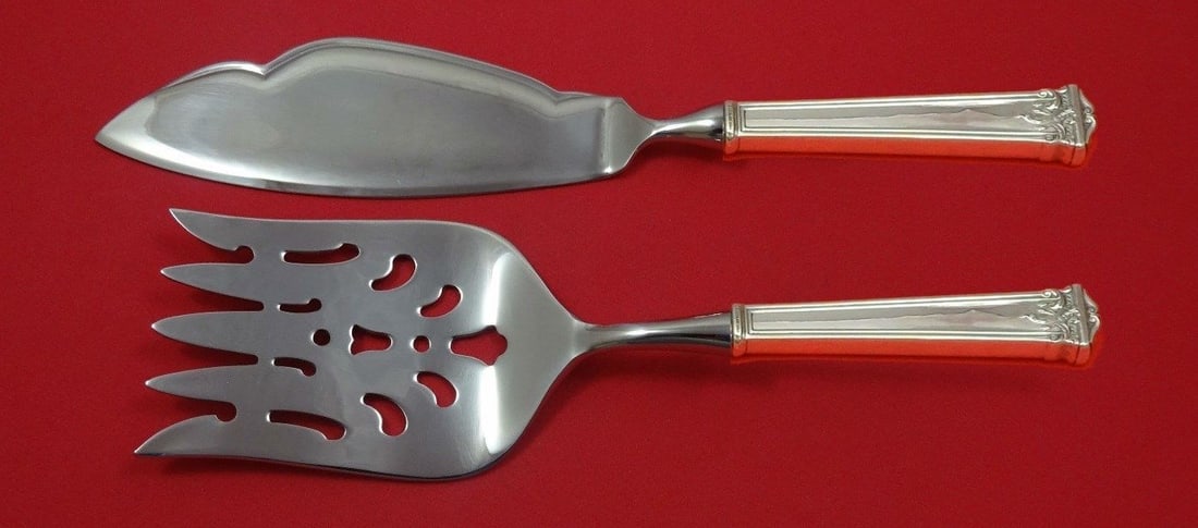 Trianon Sterling Silver Fish Serving Set 2 Pieces by International: Trianon Sterling Silver Fish Serving Set 2 Pieces by International Elevate your dining experience with the exquisite Trianon Fish Serving Set by International Sterling Silver. This two-piece set featu