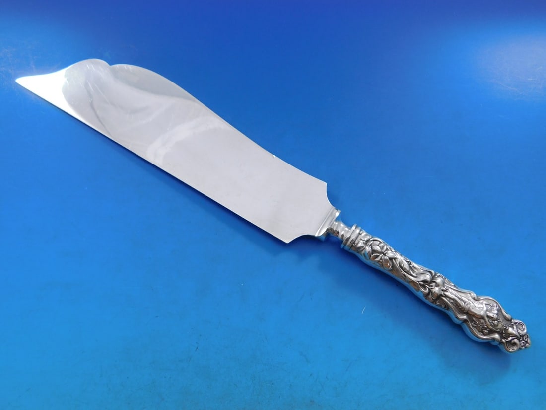 Wallace Irian Sterling Silver Ice Cream Slice 12 Inch Hollow Handle: Wallace Irian Sterling Silver Ice Cream Slice 12 Inch Hollow Handle This exquisite ice cream slice from the Irian pattern by Wallace showcases a beautiful combination of sterling silver and silverplat