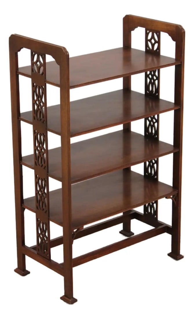 Mahogany 4 tier etagere Baker Historic Charleston 20.5 W x 12 D x 33 H: Mahogany 4 tier etagere Baker Historic Charleston 20.5 W x 12 D x 33 H A Baker Historic Charleston 4-tier etagere shelf in mahogany, designed in an 18th century Chippendale style with traditional fret