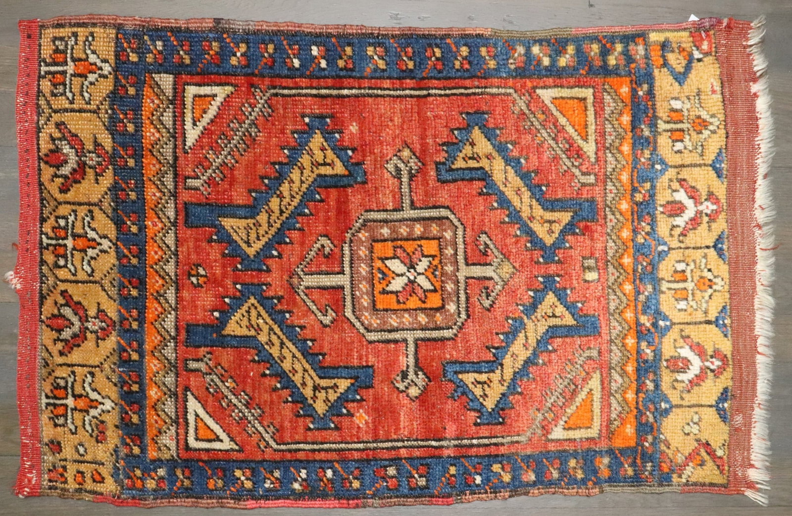 1' 10" x 2' 7" Early 20th Century Turkish Anatolian Yastik Rug: 1' 10" x 2' 7" Early 20th Century Turkish Anatolian Yastik Rug Early 20th century Turkish Anatolian small rug in the Yastiks category. This pre-owned tribal rug retains its original regional classific