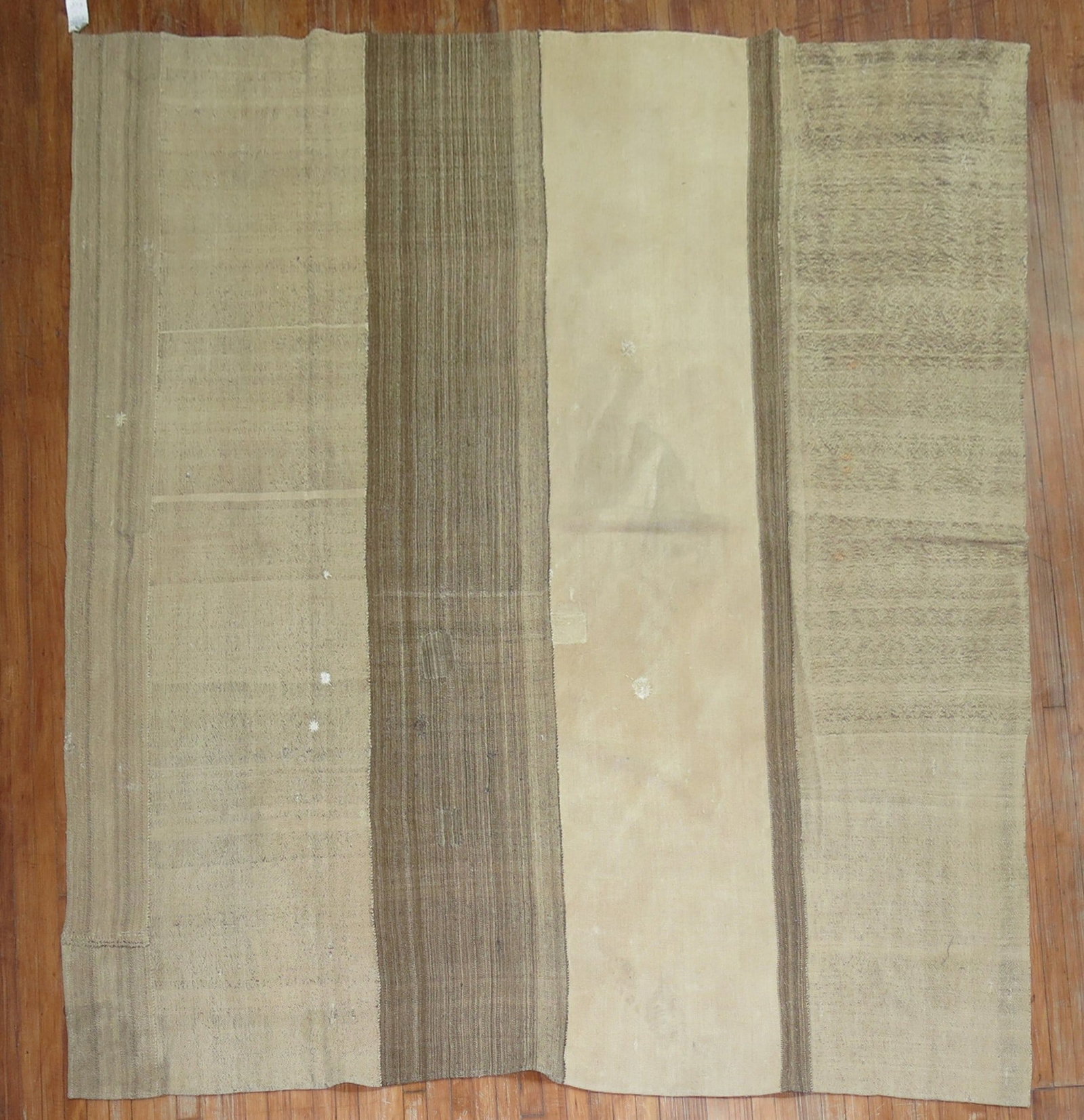 8' 1" x 8' 10" Turkish Kilim Square Rug Mid-Century: 8' 1" x 8' 10" Turkish Kilim Square Rug Mid-Century Vintage Turkish square kilim rug with a Mid-Century look and a modern twist. The rug has a darker area or large stain in the middle section, reporte