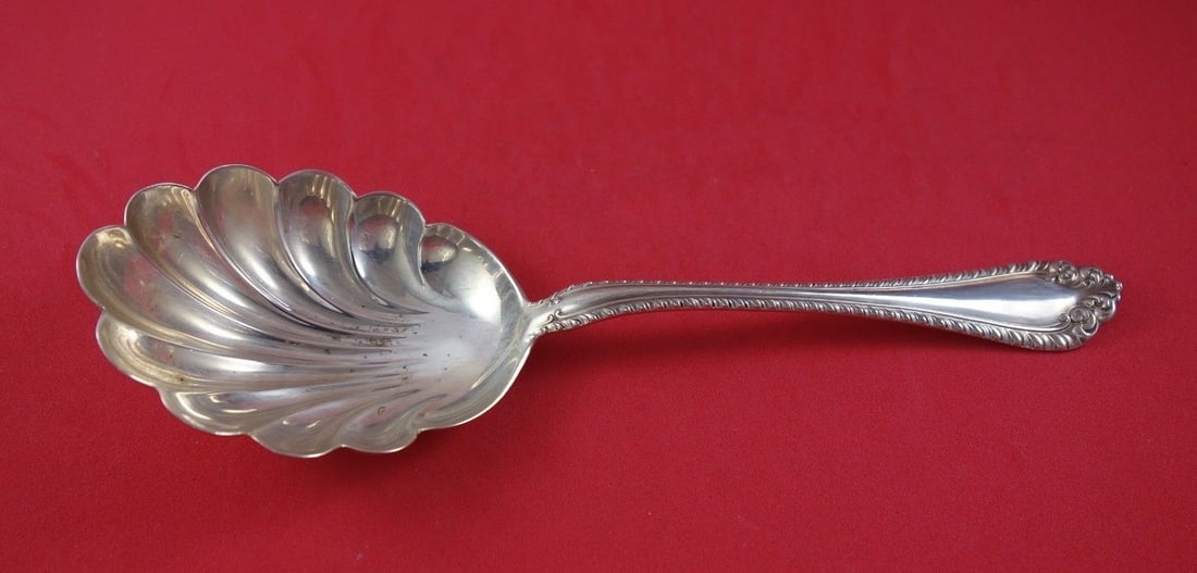 Alvin Melrose Sterling Silver 9 inch Berry Spoon with Shell Bowl: Alvin Melrose Sterling Silver 9 inch Berry Spoon with Shell Bowl Introducing the Melrose Berry Spoon by Alvin, crafted from high-quality Sterling Silver. This exquisite serving spoon features a beauti
