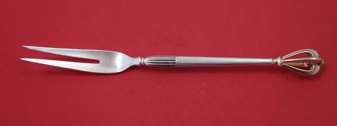 W&S Sorensen Golden Crown Sterling Silver 2-Tine Serving Fork 7.25": W&S Sorensen Golden Crown Sterling Silver 2-Tine Serving Fork 7.25" The Golden Crown serving fork by W&S Sorensen is a stunning piece crafted from high-quality sterling silver. This 2-tine fork measur