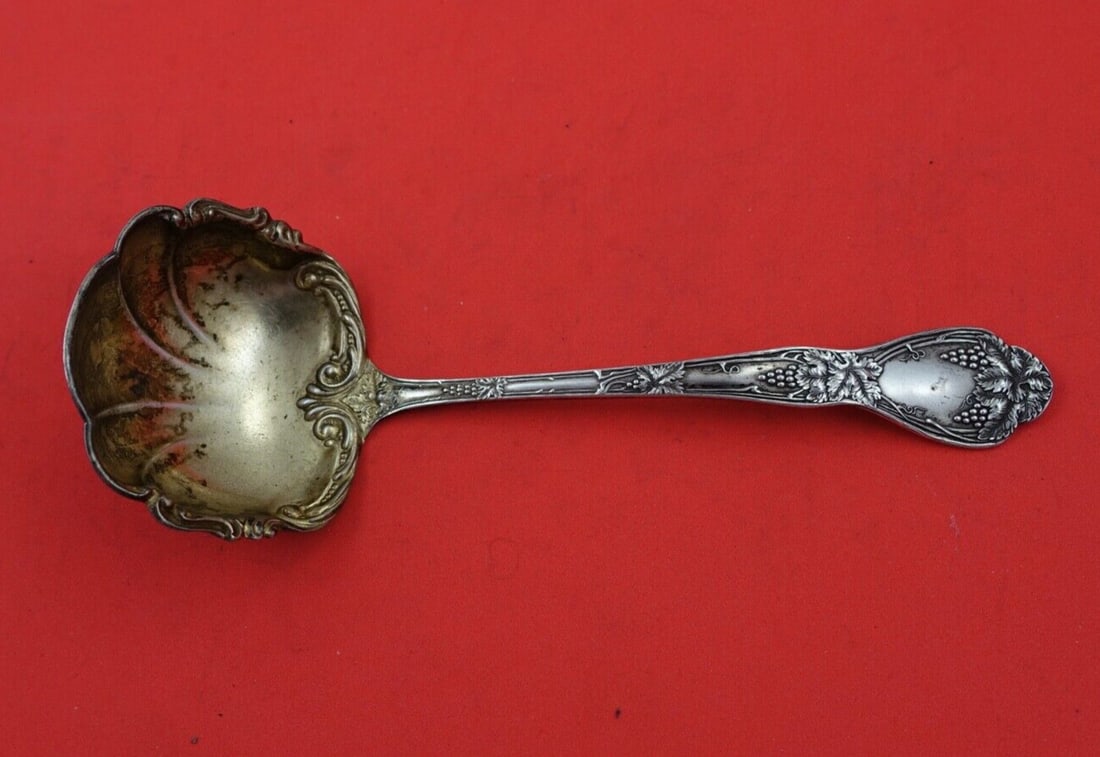 Blackinton Verona Sterling Silver Gravy Ladle Gold Wash 7 1/4": Blackinton Verona Sterling Silver Gravy Ladle Gold Wash 7 1/4" This exquisite gravy ladle is part of the Verona pattern by Blackinton, crafted from fine sterling silver. Measuring 7 1/4 inches in leng