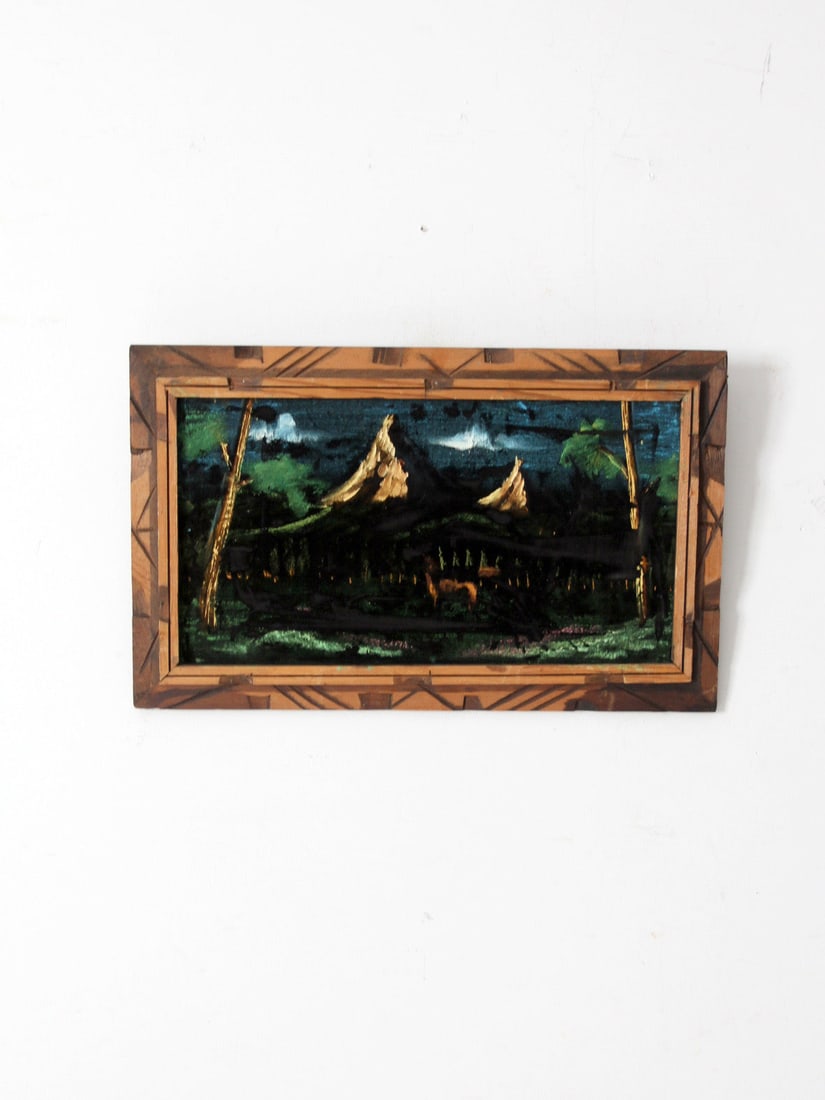 Vintage Velvet Forest Landscape Painting in Rustic Wood Frame: Vintage Velvet Forest Landscape Painting in Rustic Wood Frame This vintage velvet painting features a dramatic forest and mountain landscape, depicted in rich, moody tones that evoke a sense of depth 