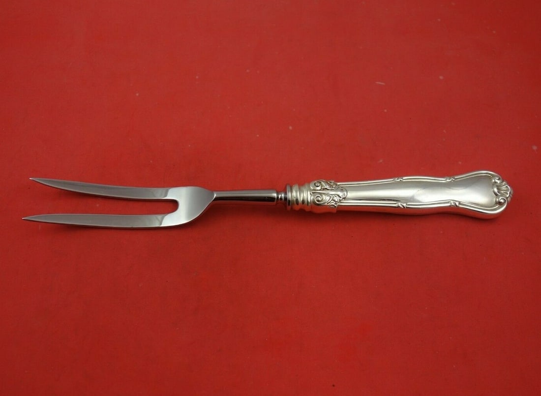 Tiffany & Co Provence Sterling Silver Roast Carving Fork 11": Tiffany & Co Provence Sterling Silver Roast Carving Fork 11" This exquisite roast carving fork from Tiffany & Co. features the elegant Provence pattern and is crafted from sterling silver with a hollo
