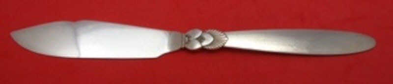 Georg Jensen Cactus Sterling Silver Fish Knife 7 7/8 inches: Georg Jensen Cactus Sterling Silver Fish Knife 7 7/8 inches This exquisite fish knife, part of the iconic Cactus pattern by Georg Jensen, showcases the elegance of sterling silver craftsmanship. Measu