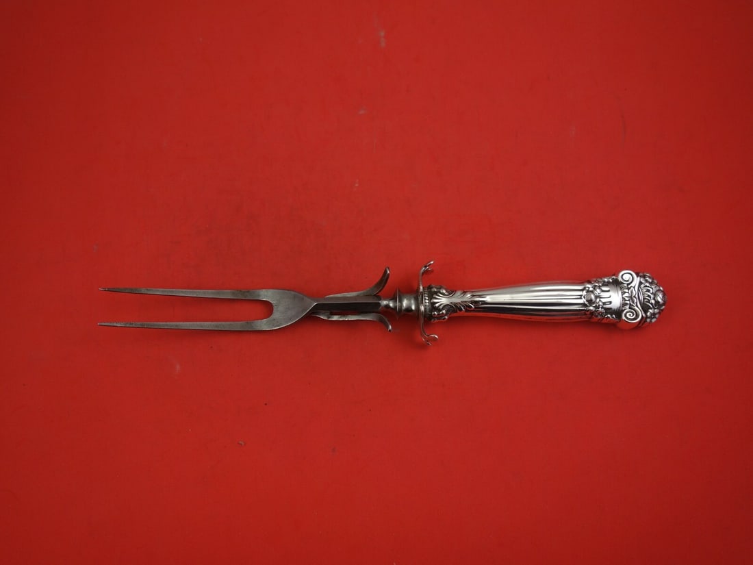 Towle Georgian Sterling Silver Carving Fork 11 1/4 Inch: Towle Georgian Sterling Silver Carving Fork 11 1/4 Inch This exquisite roast carving fork is crafted from sterling silver and showcases the elegant Georgian pattern by Towle. Measuring 11 1/4 inches, 