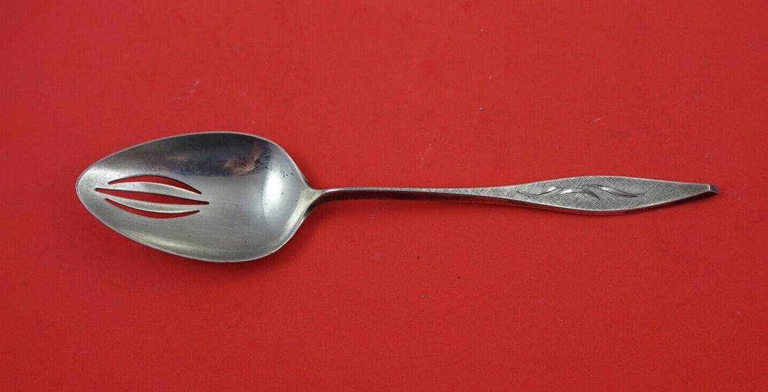 Reed and Barton Cellini Engraved Sterling Silver Pierced Serving Spoon 8.5 in: Reed and Barton Cellini Engraved Sterling Silver Pierced Serving Spoon 8.5 in This exquisite serving spoon is crafted in sterling silver and features the elegant Cellini Engraved pattern by Reed & Bar