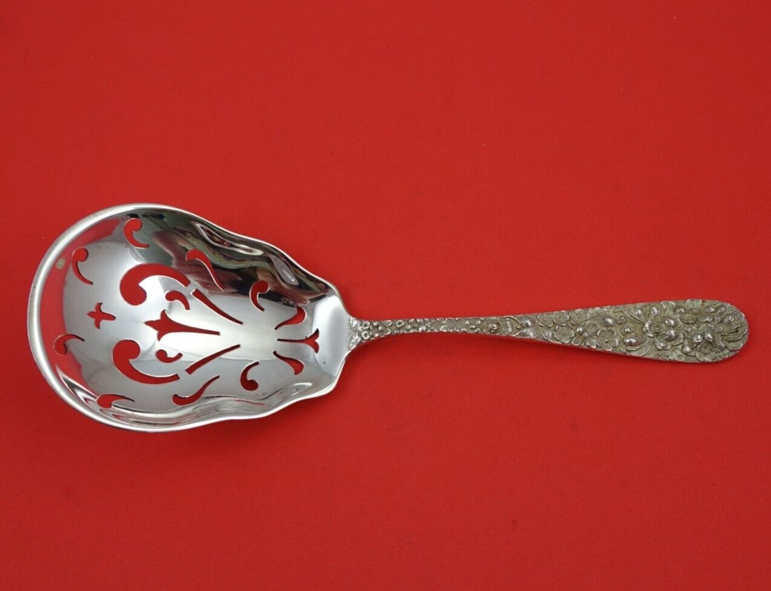 Stieff Rose Sterling Silver 8 Inch Pierced Ice Spoon: Stieff Rose Sterling Silver 8 Inch Pierced Ice Spoon This exquisite ice spoon is crafted from sterling silver and features the elegant Rose pattern by Stieff. Measuring 8 inches in length, it is desig