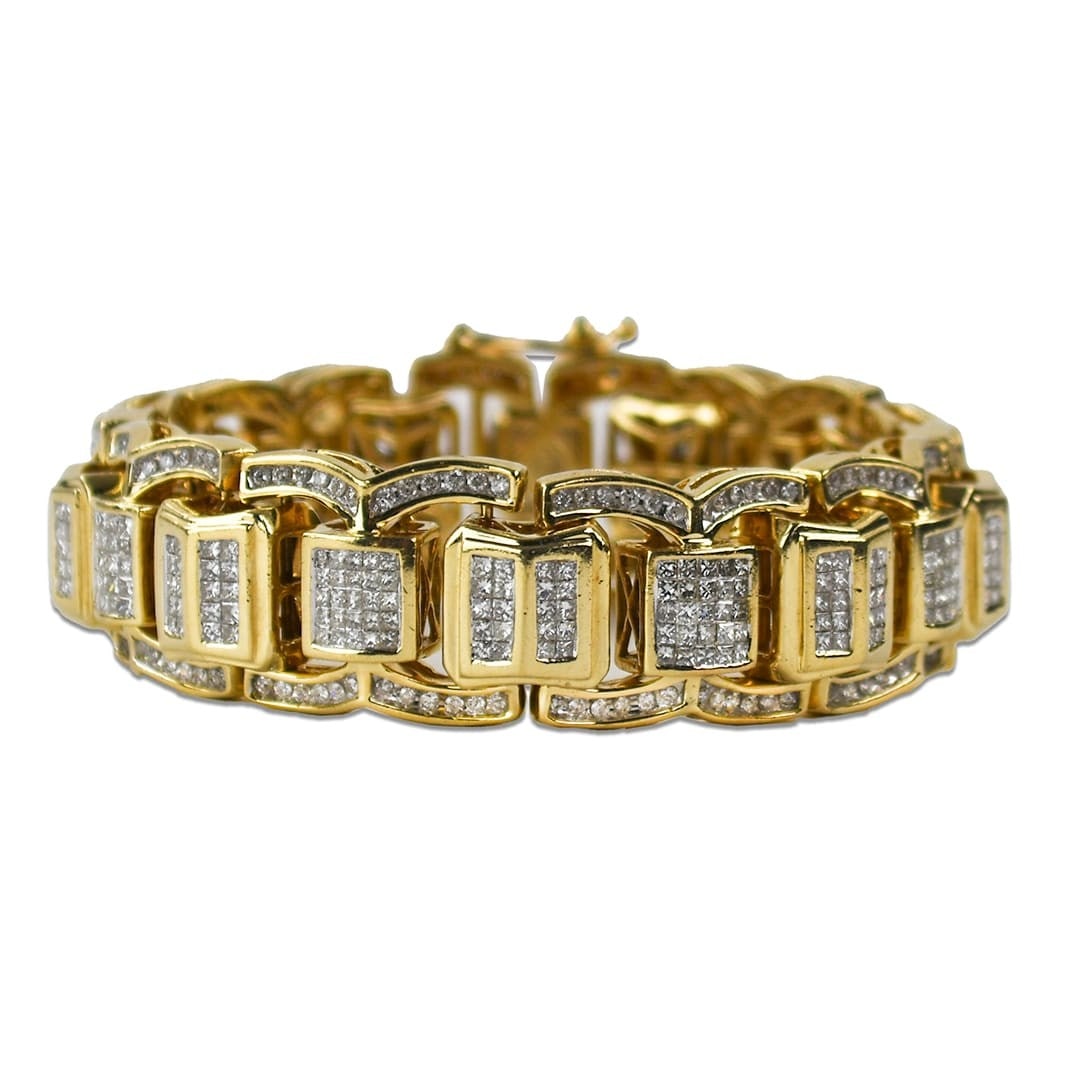Unbranded 14K Yellow Gold Diamond Cuff Bracelet 11 ct: Unbranded 14K Yellow Gold Diamond Cuff Bracelet 11 ct Custom-made 14k yellow gold cuff bracelet set with natural diamonds in a diamond-encrusted design. The center features princess-cut diamonds, with
