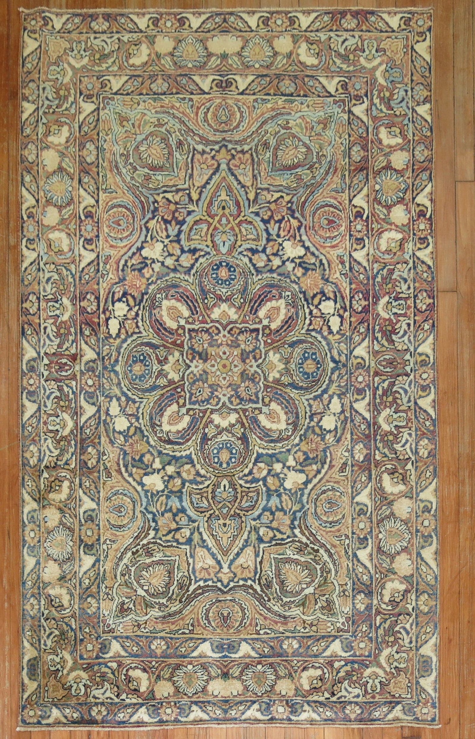 4' 1" x 6' 7" Antique Persian Kerman Accent Rug: 4' 1" x 6' 7" Antique Persian Kerman Accent Rug Early 20th century antique Persian Kerman rug with a formal design. This pre-owned accent rug features intricate floral and geometric patterning consist