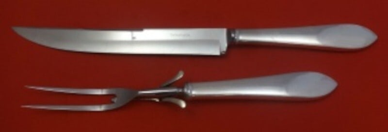 Tiffany & Co Faneuil Sterling Silver Carving Set 2pc: Tiffany & Co Faneuil Sterling Silver Carving Set 2pc Enhance your dining experience with this exquisite 2-piece roast carving set from Tiffany & Co., featuring the elegant Faneuil pattern. Crafted fro