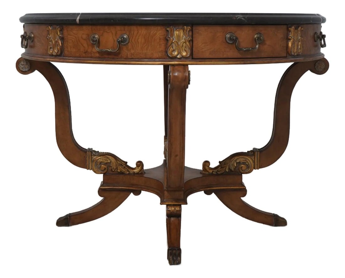 French Empire Style Round Marble Center Table With Burl Elm Skirt and Gold Accents: French Empire Style Round Marble Center Table With Burl Elm Skirt and Gold Accents This French Empire style center table features a round beveled marble top, a burl elm skirt, and subtle gold accents.