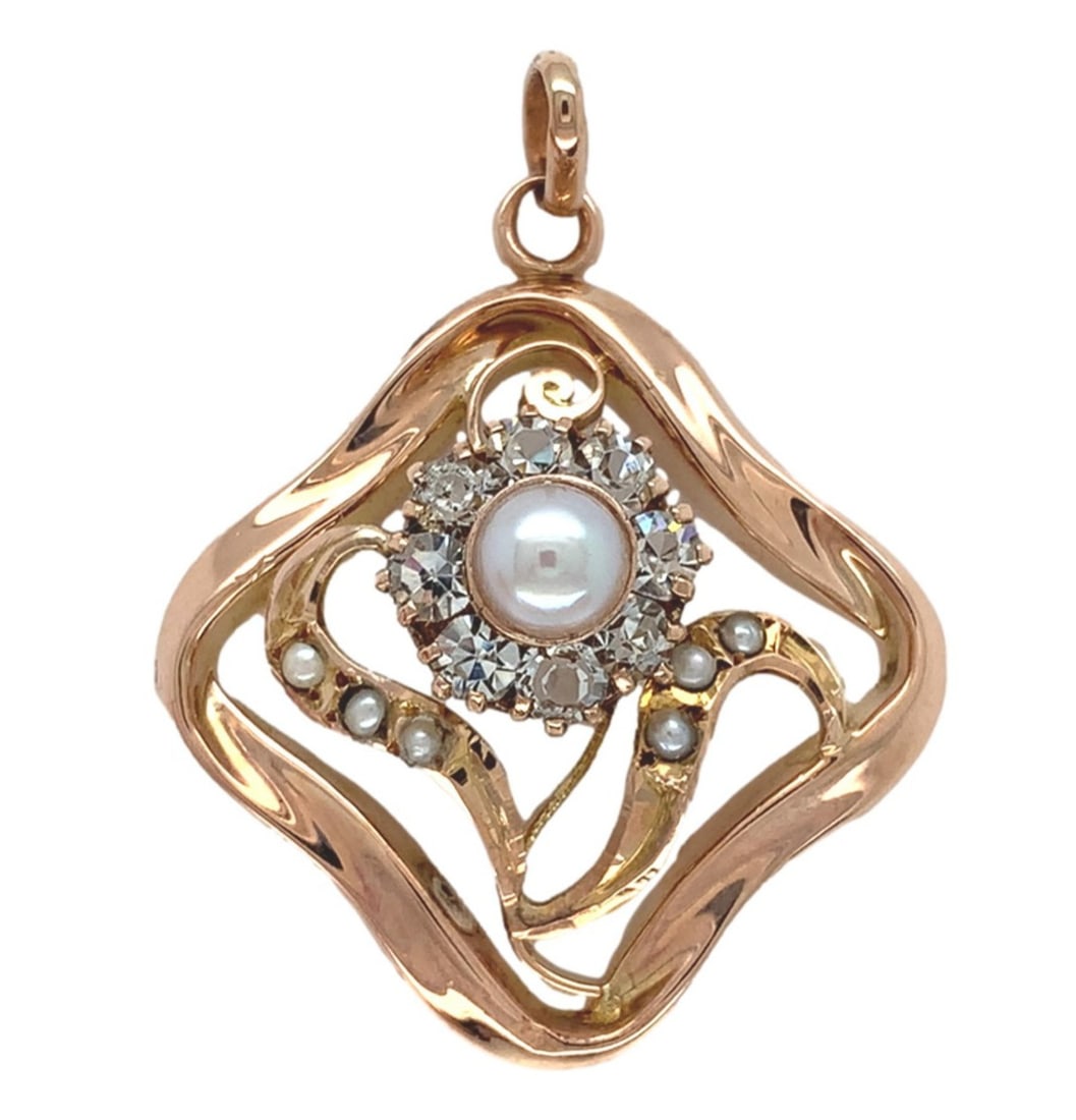 Victorian Floral Pendant in 12k Rose Gold with Pearl Seed Pearls Glass: Victorian Floral Pendant in 12k Rose Gold with Pearl Seed Pearls Glass Victorian floral pendant in 12k rose gold with a pearl center, seed pearl accents, and clear glass/paste stones. The piece is des