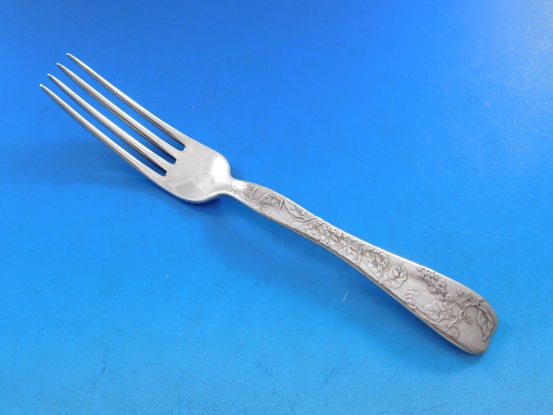 Tiffany & Co Sterling Silver Fork Lap Over Edge Grape Leaves 7 1/4 in: Tiffany & Co Sterling Silver Fork Lap Over Edge Grape Leaves 7 1/4 in This exquisite sterling silver fork, crafted by Tiffany & Co., features a stunning Lap Over Edge pattern with an intricate acid-et