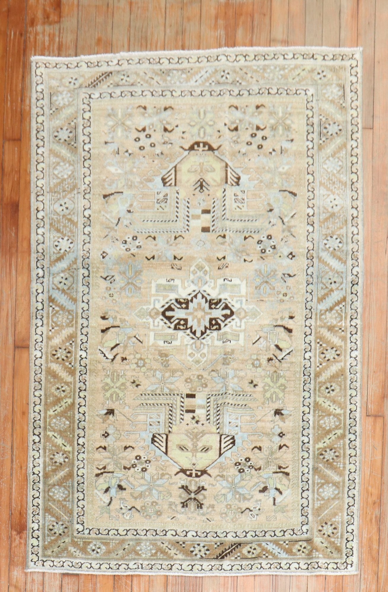 3' 7" x 5' 5" Persian Serapi Heriz Rug in Neutral Tones: 3' 7" x 5' 5" Persian Serapi Heriz Rug in Neutral Tones Early 20th century Persian Heriz rug in a neutral color palette. This pre-owned small rug is identified as a Serapi/Heriz type. Specifications T