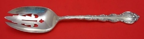 Wallace Feliciana Sterling Silver Slotted Serving Spoon 6-Hole 8.5 Inch: Wallace Feliciana Sterling Silver Slotted Serving Spoon 6-Hole 8.5 Inch Discover the elegance of the Feliciana serving spoon by Wallace, expertly crafted from sterling silver. This slotted spoon featu