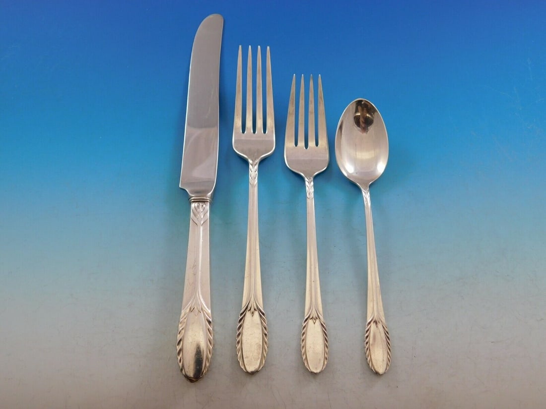 International Sterling Silver Trousseau 4-Piece Place Setting: International Sterling Silver Trousseau 4-Piece Place Setting This exquisite 4-piece place setting by International Sterling Silver features a beautiful estate trousseau design, crafted from high-qual