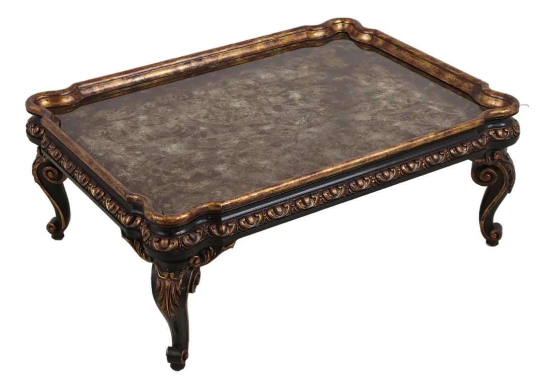 French Style Painted Eglomise Glass Coffee Table With Ornate Tray Top: French Style Painted Eglomise Glass Coffee Table With Ornate Tray Top This vintage coffee table features an impressive eglomise paint decorated tray top with a striking black and gold finish. The tabl