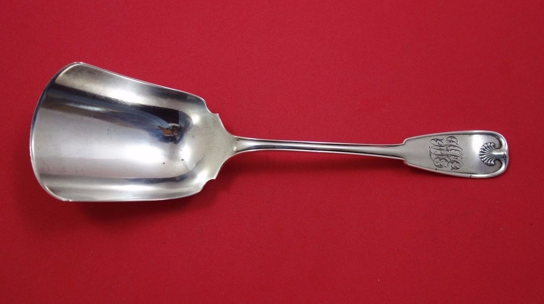 Tiffany & Co. Palm Sterling Silver Cracker Scoop 9.5" Monogrammed: Tiffany & Co. Palm Sterling Silver Cracker Scoop 9.5" Monogrammed This exquisite cracker scoop from Tiffany & Co. showcases the timeless elegance of sterling silver. Crafted between 1850 and 1899, thi