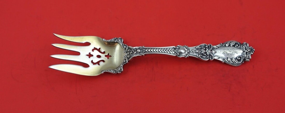 Gorham Henry II Sterling Silver Pierced Cold Meat Fork 8.5": Gorham Henry II Sterling Silver Pierced Cold Meat Fork 8.5" This exquisite Henry II cold meat fork by Gorham is a timeless piece crafted from sterling silver. With a length of 8 1/2 inches, it feature