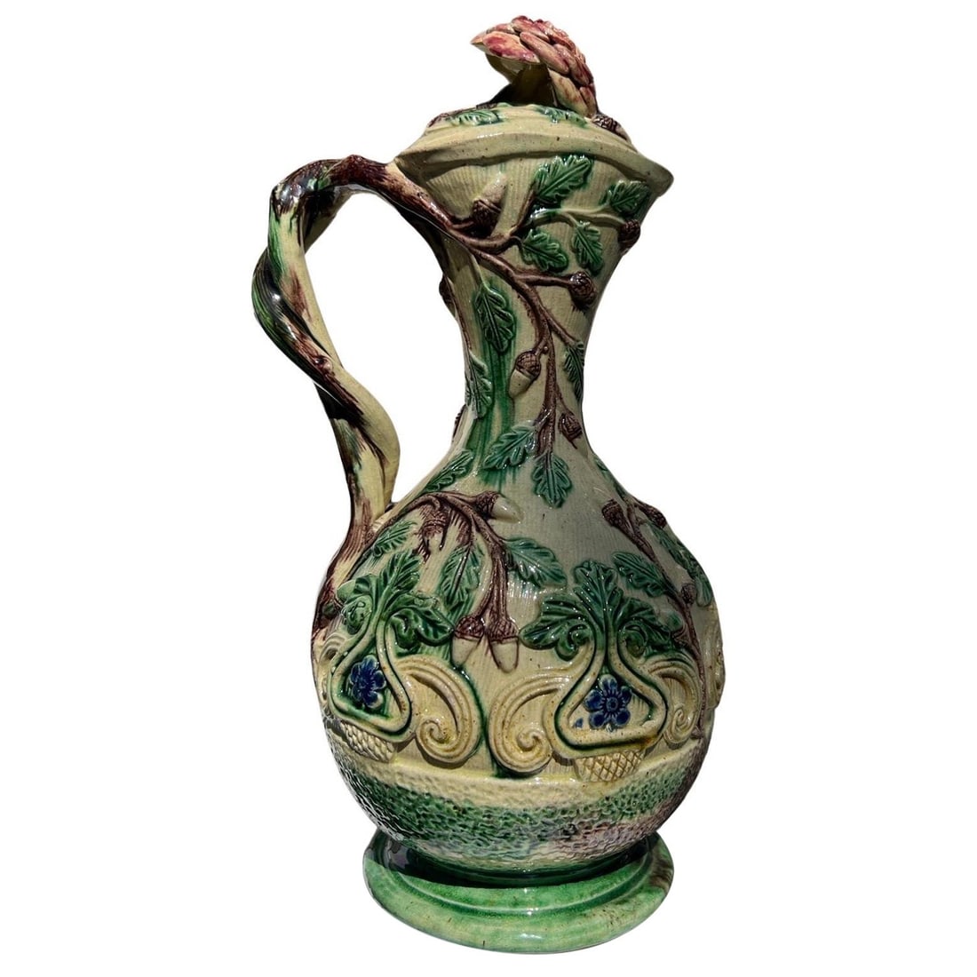 19th Century Faux Bois Majolica Ewer with Acorn and Foliate Design: 19th Century Faux Bois Majolica Ewer with Acorn and Foliate Design This stunning 19th Century Faux Bois Majolica Ewer features intricate acorn and foliate designs, showcasing the craftsmanship of the 
