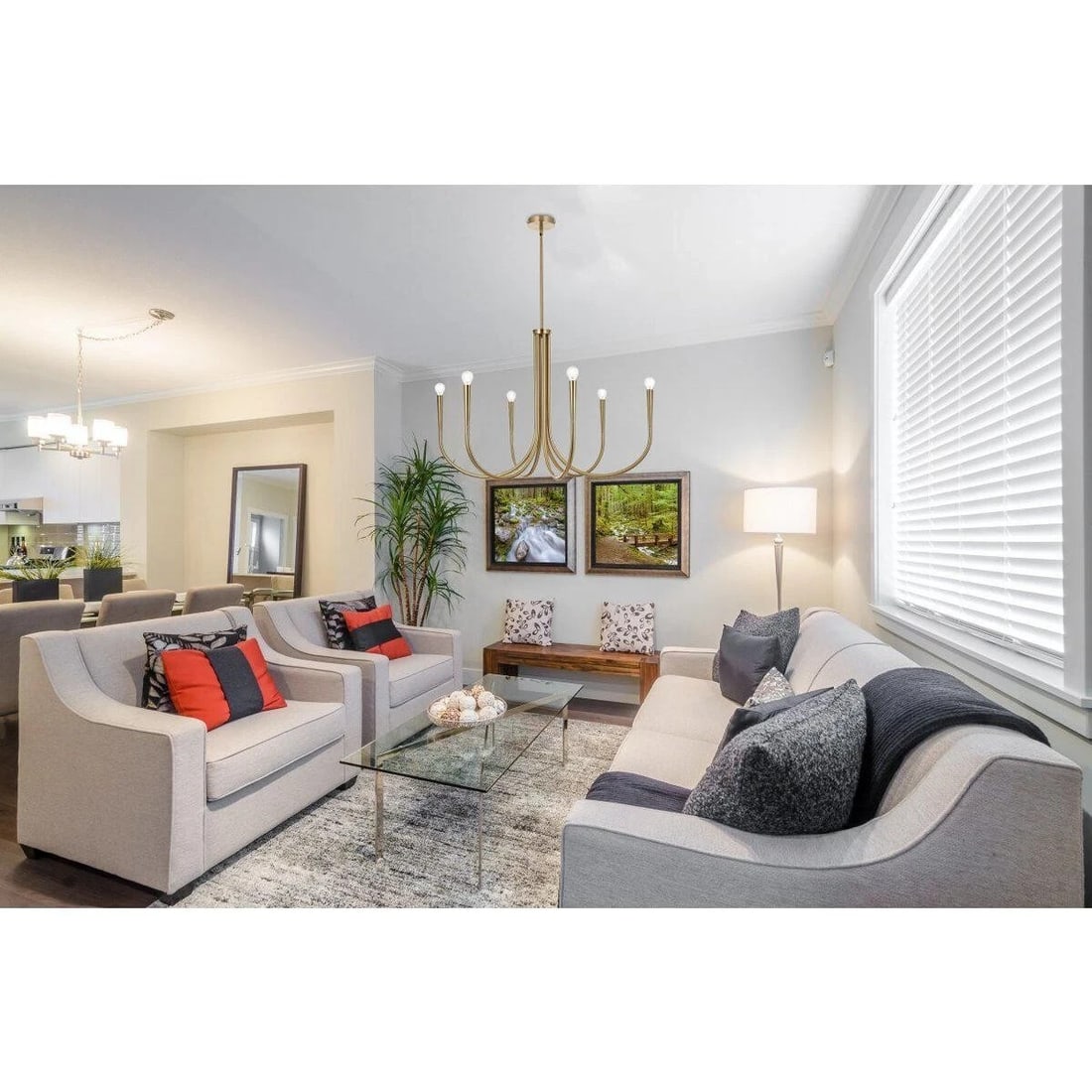 Living District 6-Light Farmhouse Goldish Chandelier 36 Inch: Living District 6-Light Farmhouse Goldish Chandelier 36 Inch This farmhouse-style chandelier features a goldish satin gold finish and a sturdy iron and steel frame. Designed for versatile use in space