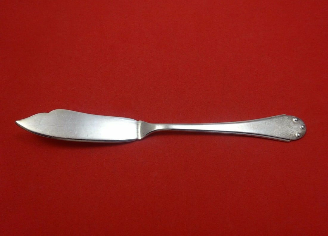 Calegaro Bugatti Sterling Silver Fish Knife 8 1/8" Modern Design: Calegaro Bugatti Sterling Silver Fish Knife 8 1/8" Modern Design Introducing the Bugatti Fish Knife by Calegaro, a stunning piece of Italian craftsmanship. This knife features a unique modernistic des