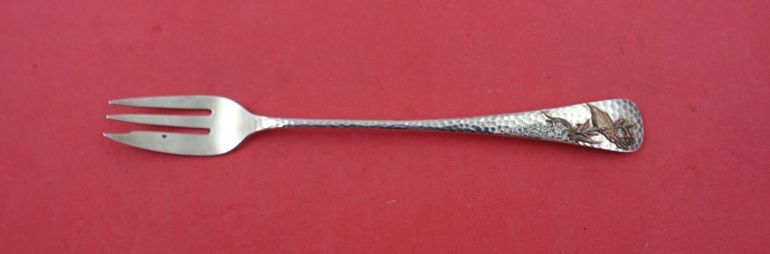 Gorham Applied Metals Sterling Silver Cocktail Fork with Bird 6 1/8": Gorham Applied Metals Sterling Silver Cocktail Fork with Bird 6 1/8" This exceptional cocktail fork is a striking example from the Applied Metals pattern by Gorham, crafted from high-quality sterling 
