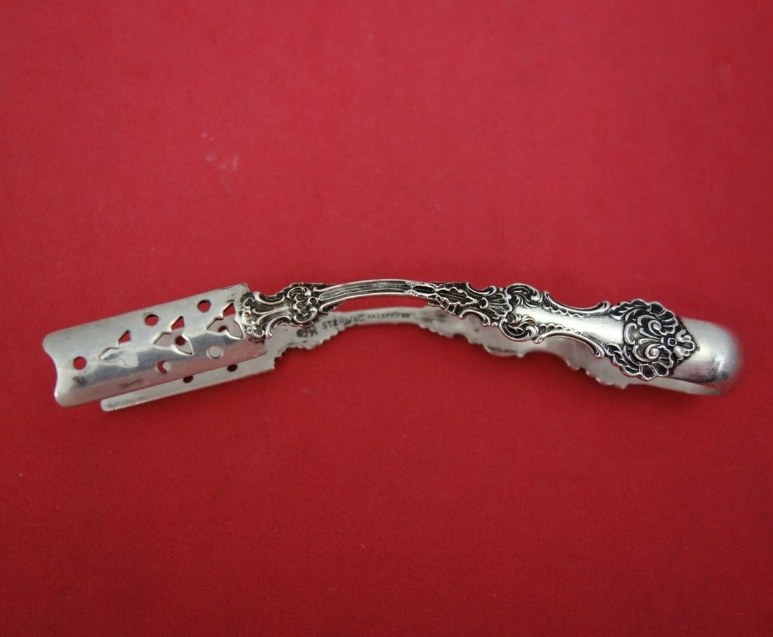 Whiting Pompadour Sterling Silver Asparagus Tong 4 1/4 Inch: Whiting Pompadour Sterling Silver Asparagus Tong 4 1/4 Inch This exquisite asparagus tong is crafted from sterling silver and features the elegant Pompadour pattern by Whiting. Measuring 4 1/4 inches,