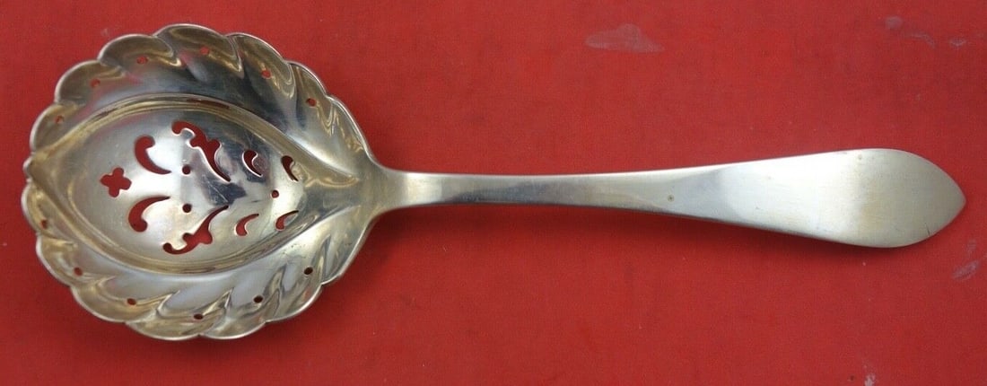 Tiffany & Co. Queen Anne Sterling Silver Sugar Sifter 7 1/4": Tiffany & Co. Queen Anne Sterling Silver Sugar Sifter 7 1/4" This exquisite Queen Anne sugar sifter by Tiffany & Co. is crafted from high-quality sterling silver. Measuring 7 1/4 inches in length, thi
