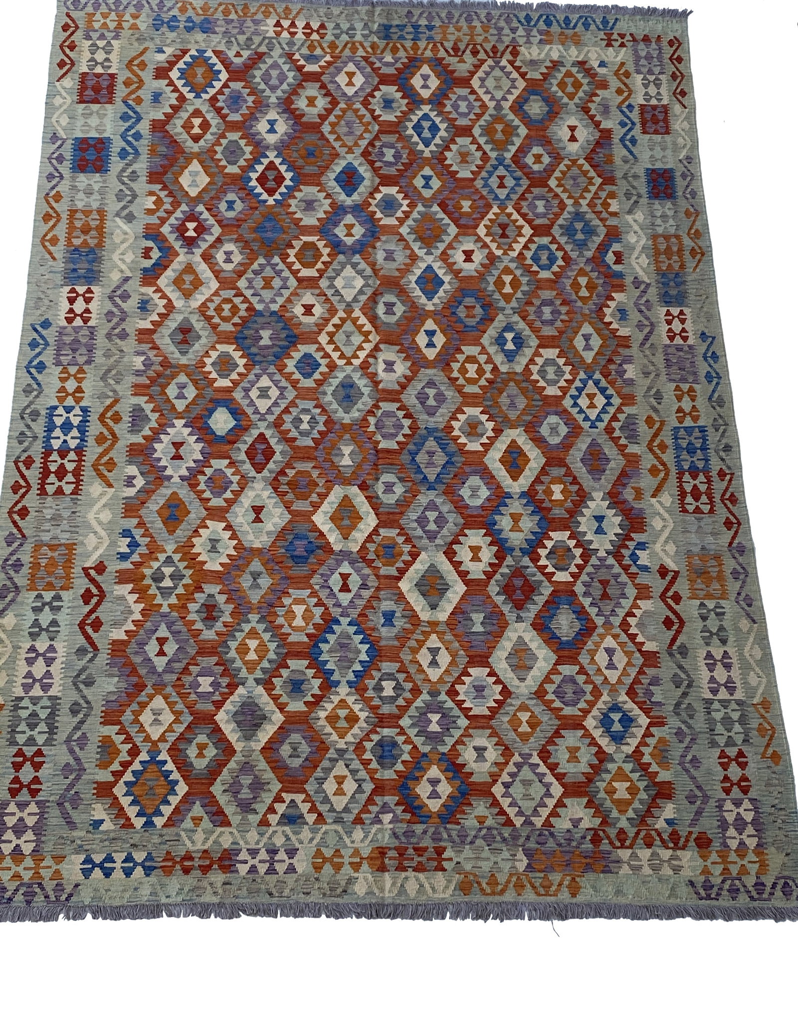 Handmade 8x12 Multi-Color Red Geometric Kilim Rug from Afghanistan: Handmade 8x12 Multi-Color Red Geometric Kilim Rug from Afghanistan Free continental US Shipping Enhance your home decor with the stunning 8 x 12 Multi-Color Red Kilim Rug, a beautiful handwoven piece 