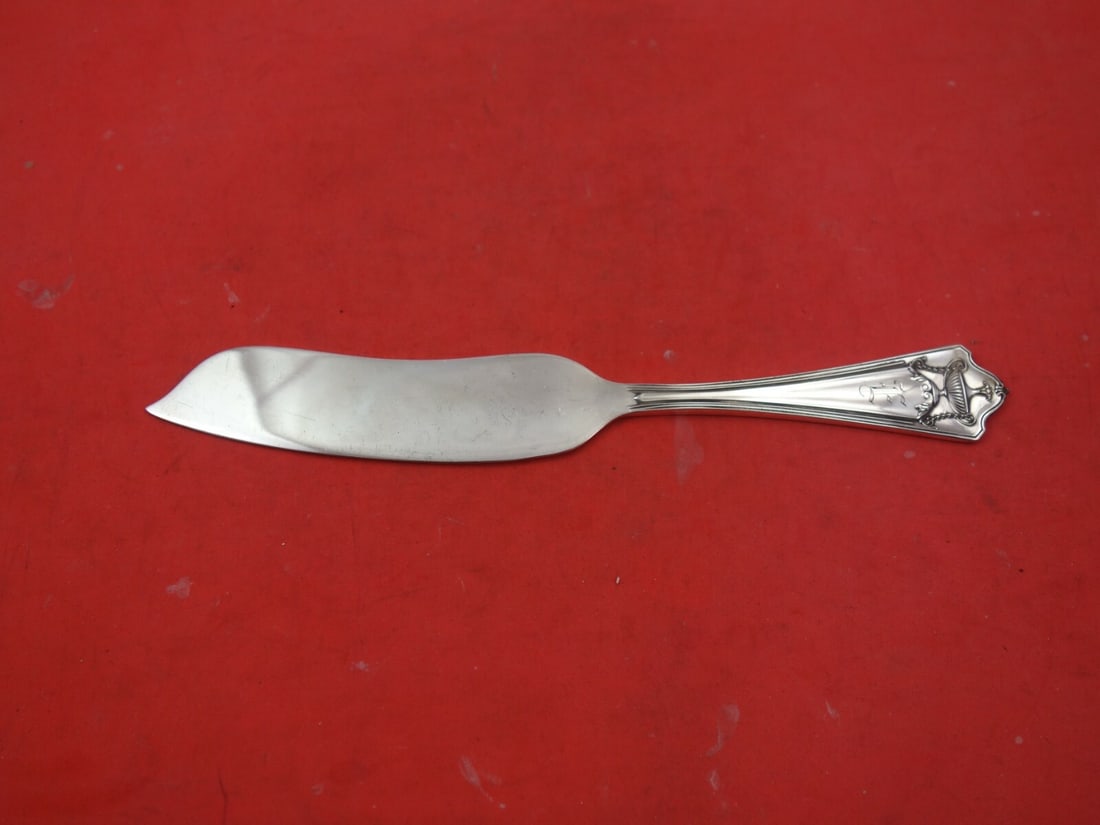 Whiting Pompeian All-Sterling Silver Fish Knife 7 7/8 Flat Handle: Whiting Pompeian All-Sterling Silver Fish Knife 7 7/8 Flat Handle Introducing the Pompeian Fish Knife by Whiting, a sophisticated addition to your dining collection. This exquisite piece is crafted fr