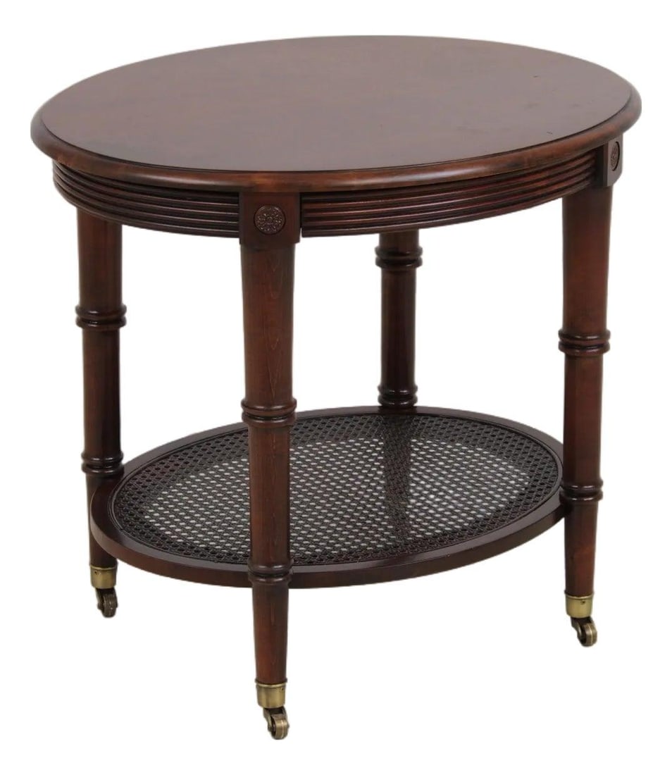 28w x 23d x 25h Ethan Allen Freeport wood side table: 28w x 23d x 25h Ethan Allen Freeport wood side table Traditional Ethan Allen Freeport cane shelf end table with high quality construction and a brown wood finish. This pre-owned piece features brass c