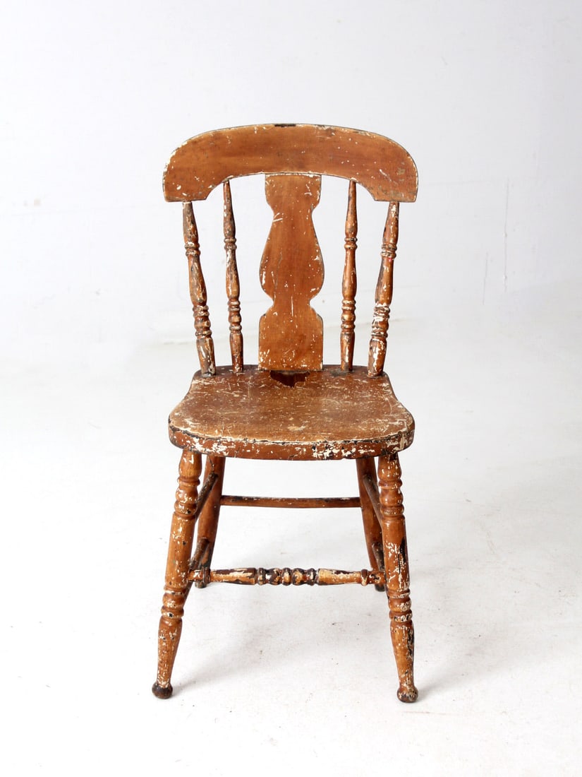19th Century Antique Splat Back Primitive Chair with Warm Brown Finish: 19th Century Antique Splat Back Primitive Chair with Warm Brown Finish This antique splat back primitive chair is a remarkable piece handcrafted in the 19th century, showcasing rugged craftsmanship an