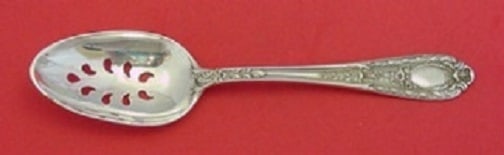International Sterling Silver Fontaine 9-Hole Slotted Serving Spoon: International Sterling Silver Fontaine 9-Hole Slotted Serving Spoon This exquisite slotted serving spoon is crafted in sterling silver and features the elegant Fontaine pattern by International Sterli
