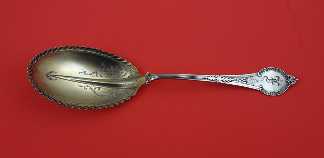 Vanderslice Comstock Sterling Silver Berry Scoop 9.5 Inch Gold Washed: Vanderslice Comstock Sterling Silver Berry Scoop 9.5 Inch Gold Washed Enhance your dining experience with this exquisite Comstock berry scoop by Vanderslice, crafted from high-quality sterling silver.