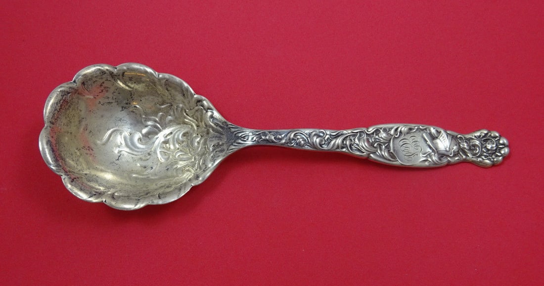 Whiting Heraldic Sterling Silver Berry Spoon Scalloped Edge 8 3/8 Inch: Whiting Heraldic Sterling Silver Berry Spoon Scalloped Edge 8 3/8 Inch This exquisite serving spoon is from the Heraldic pattern by Whiting, crafted in sterling silver. Measuring 8 3/8 inches, it feat