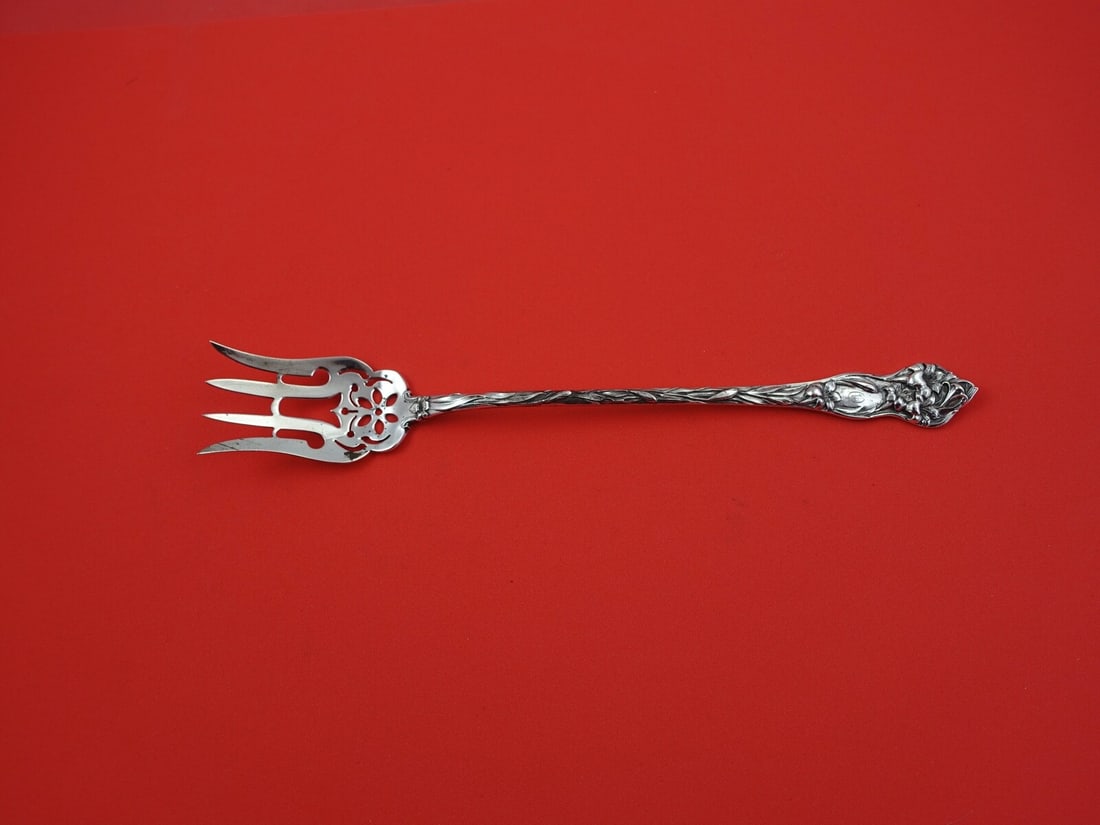 Watson Lily Sterling Silver Lettuce Fork 8 7/8 Inch Serving Fork: Watson Lily Sterling Silver Lettuce Fork 8 7/8 Inch Serving Fork This elegant serving fork is from the renowned Lily pattern by Watson, crafted in sterling silver. Measuring 8 7/8 inches, it showcases