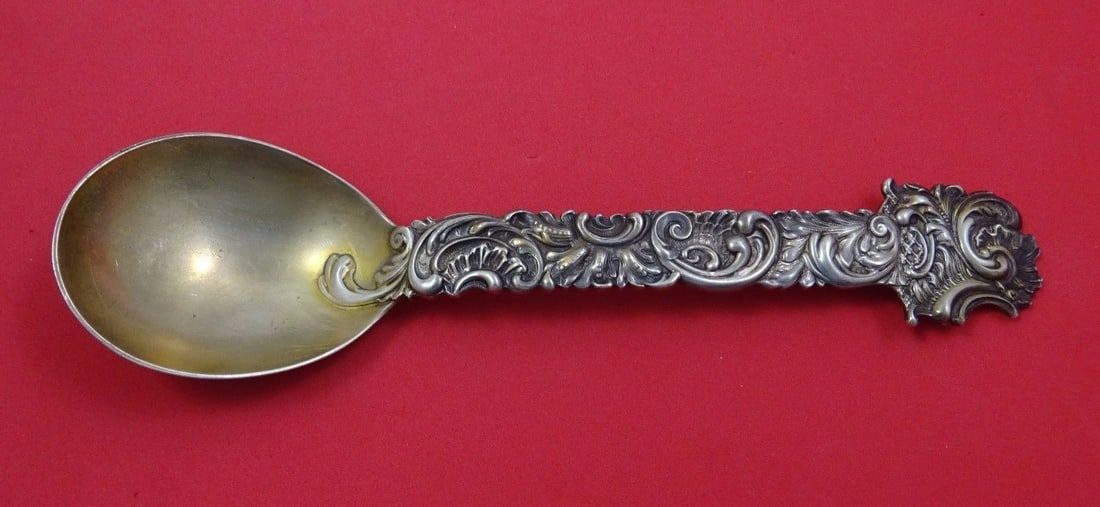 Shiebler Sterling Silver Preserve Spoon Gold Washed Heavy Cast 7.75": Shiebler Sterling Silver Preserve Spoon Gold Washed Heavy Cast 7.75" This exquisite Shiebler serving spoon is crafted from sterling silver and features a luxurious gold wash finish. Measuring 7 3/4 in