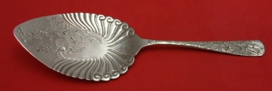 Wallace Sterling Silver Embossed Pie Server Circa 1890 9 1/4": Wallace Sterling Silver Embossed Pie Server Circa 1890 9 1/4" This exquisite pie server, crafted by Wallace circa 1890, features a beautifully embossed design with a bright cut fluted bowl. The server