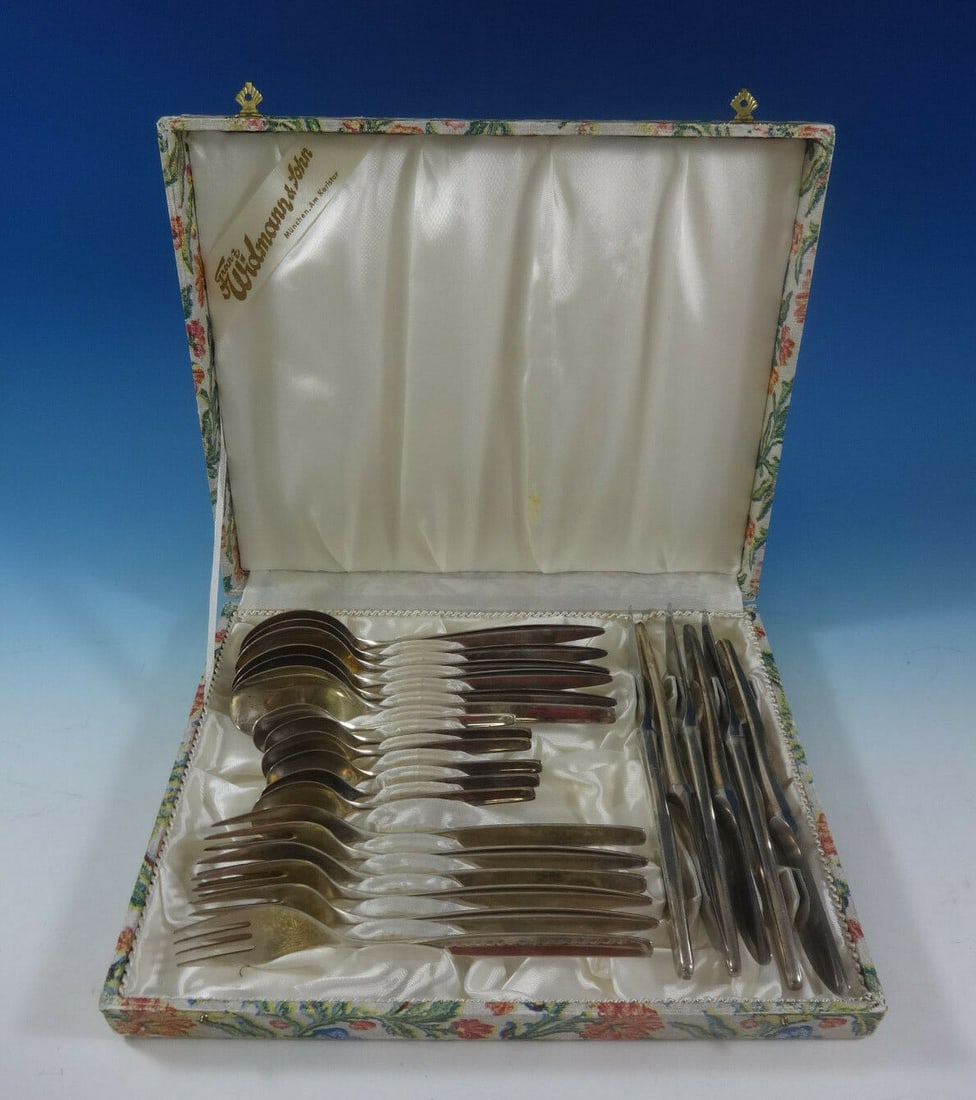 WMF 800 Silver Flatware Set 24 Pieces Vintage Box Mid-Century Modern: WMF 800 Silver Flatware Set 24 Pieces Vintage Box Mid-Century Modern This exquisite flatware set by WMF features 24 pieces crafted from 800 silver, showcasing a mid-century modern design. The set incl