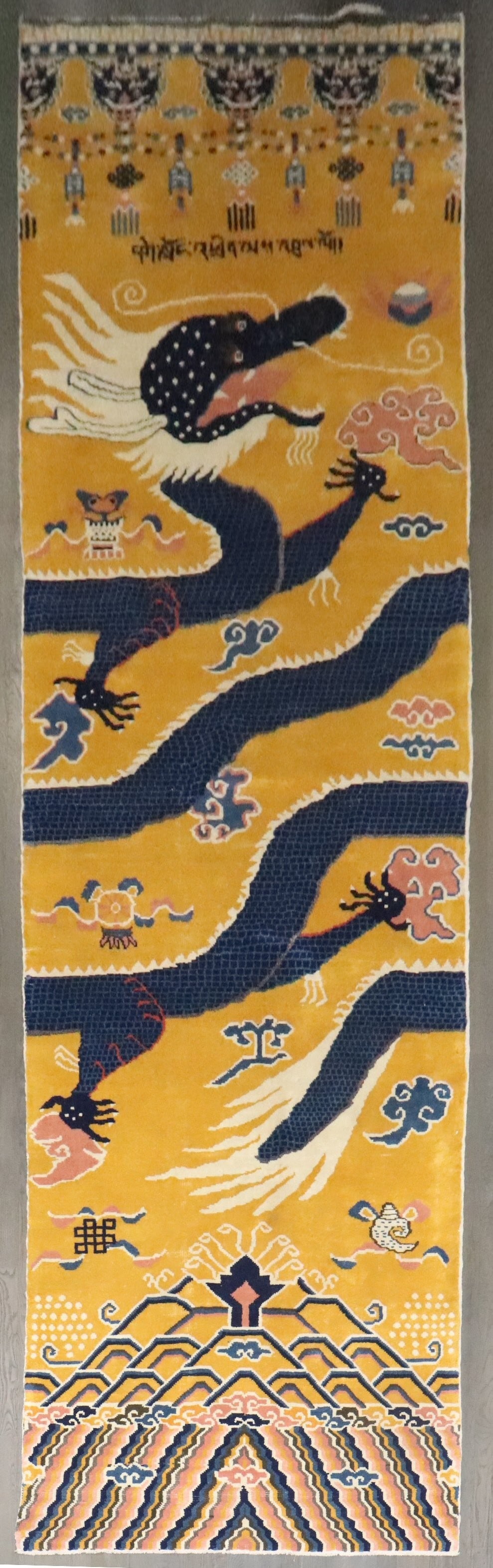4' 5" x 17' Tibetan Dragon Pillar Rug Yellow Runner: 4' 5" x 17' Tibetan Dragon Pillar Rug Yellow Runner Vintage Tibetan Dragon Pillar runner rug with a yellow background in a rare wide, large runner size. This pre-owned rug is identified as a Chinese T