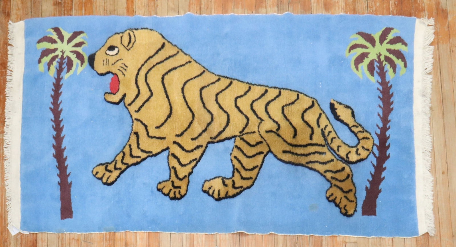 3' 11" x 7' Tibetan pictorial accent rug sky blue cheetah: 3' 11" x 7' Tibetan pictorial accent rug sky blue cheetah Late 20th century Tibetan souf pictorial accent rug featuring a raised cheetah motif on a sky blue ground. This pre-owned rug offers a distinc