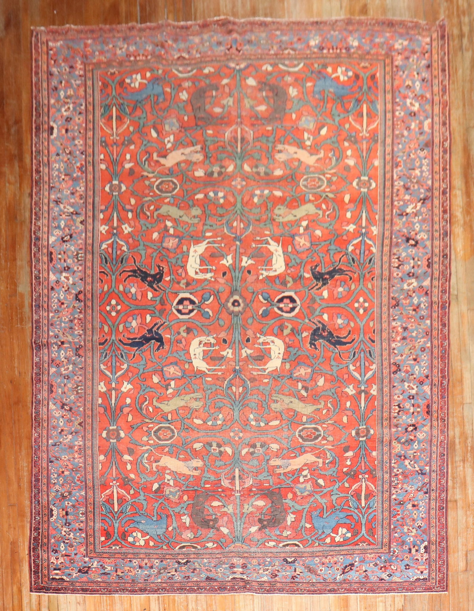 8' 6" x 13' 5" Persian pictorial Mahal room rug: 8' 6" x 13' 5" Persian pictorial Mahal room rug Early 20th century Persian Mahal animal pictorial rug with age-related wear. This pre-owned room-size rug features a pictorial design and is identified