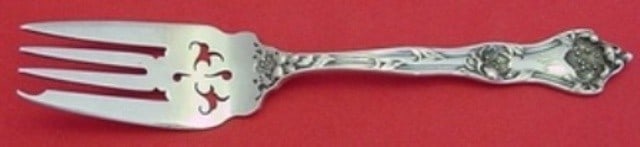 Reed Barton Intaglio Sterling Silver Fish Fork Pierced Floral 6 1/4: Reed Barton Intaglio Sterling Silver Fish Fork Pierced Floral 6 1/4 A Reed & Barton Intaglio sterling silver fish fork with a pierced flower design. It is monogrammed, with monos varying, and is descr
