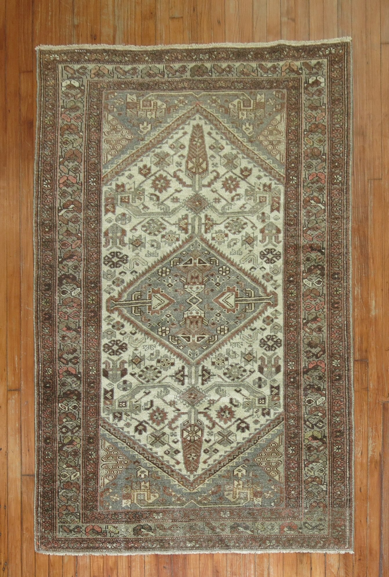 4' 4" x 6' 8" Early 20th Century Persian Malayer Rug: 4' 4" x 6' 8" Early 20th Century Persian Malayer Rug Early 20th century Persian Malayer rug with a rustic character and intricate geometric patterning. This pre-owned accent rug offers a classic Malay