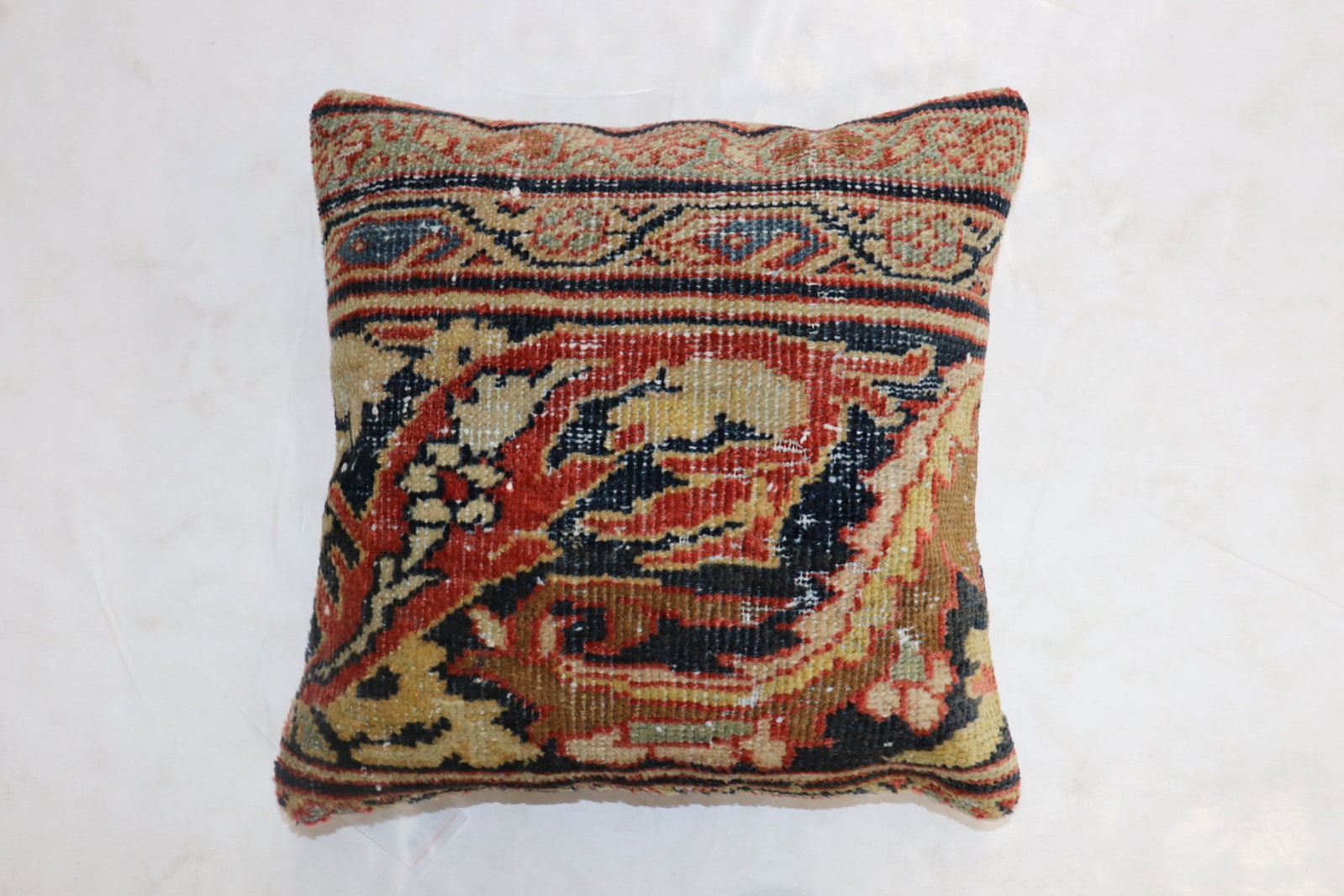 Antique Persian Sultanabad Rug Border Pillow 1' 6" x 1' 6": Antique Persian Sultanabad Rug Border Pillow 1' 6" x 1' 6" Decorative pillow made from the border of an antique Persian Sultanabad rug. This pre-owned piece offers a distinctive textile accent while p