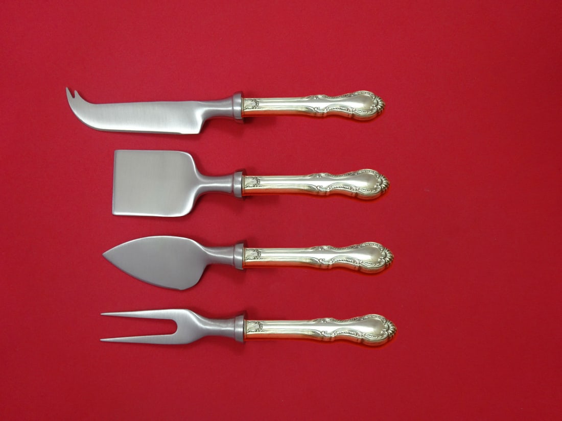 International Sterling Southern Colonial 4pc Cheese Serving Set: International Sterling Southern Colonial 4pc Cheese Serving Set This exquisite 4-piece cheese serving set features the Southern Colonial pattern by International Sterling. Crafted from sterling silver